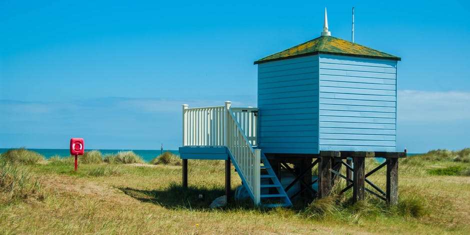海滩-海滩小屋-蓝色的高清照片